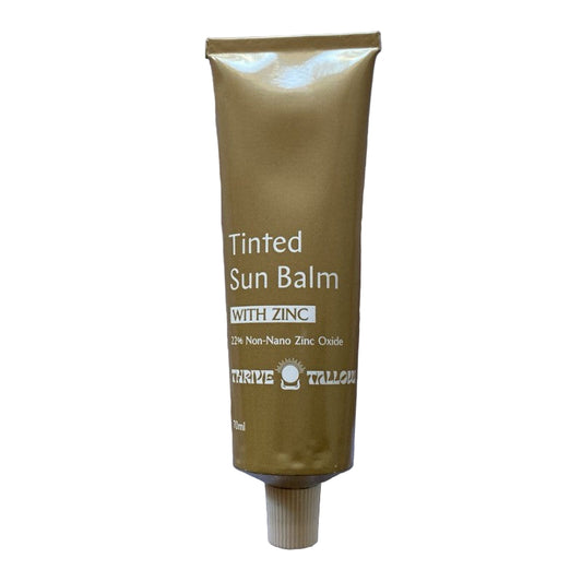 Tube of Tinted Sun Balm with Zinc on a white background