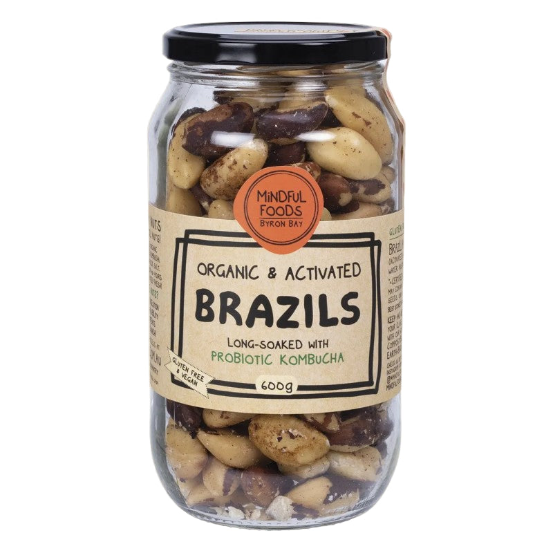 Jar of organic and activated brazil nuts with a label on a white background