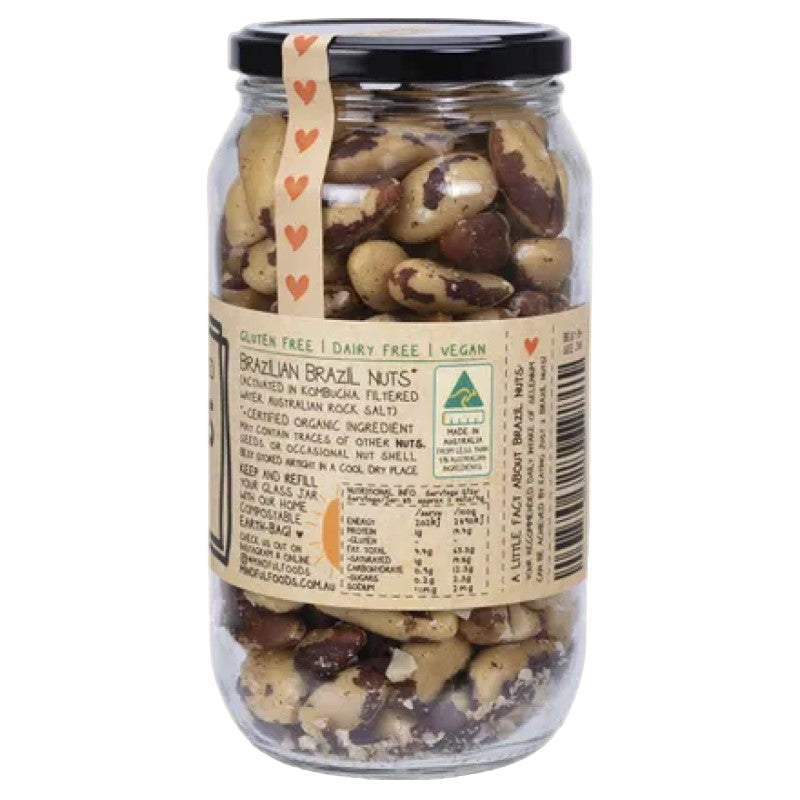 Jar of Brazil nuts with a label on a white background