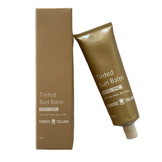 Tinted Sun Balm with box on a white background