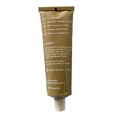 Gold tube with text on a white background